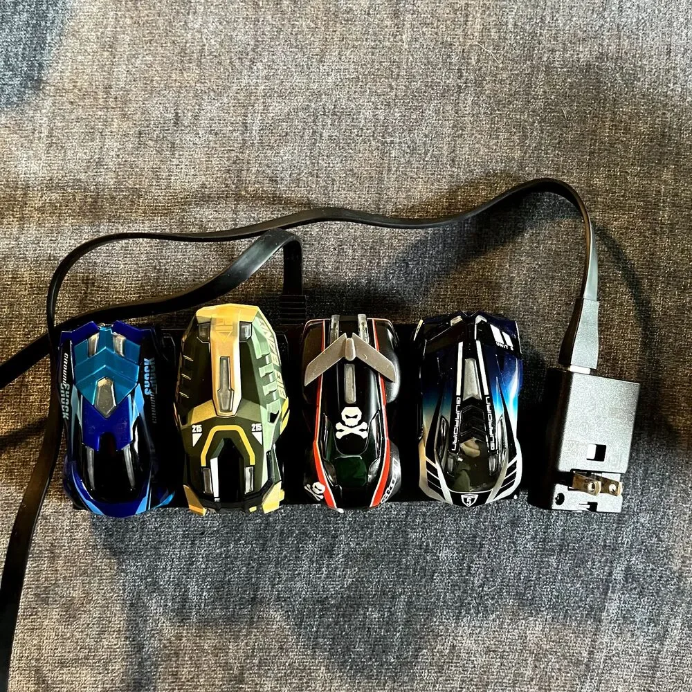 Anki Overdrive Lot of 4 Race Cars With Charging Base  *Untested with app*
